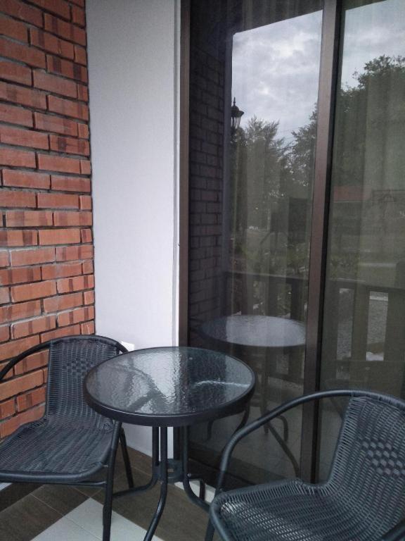 Ein Balkon oder eine Terrasse in der Unterkunft Red Coral Cottage