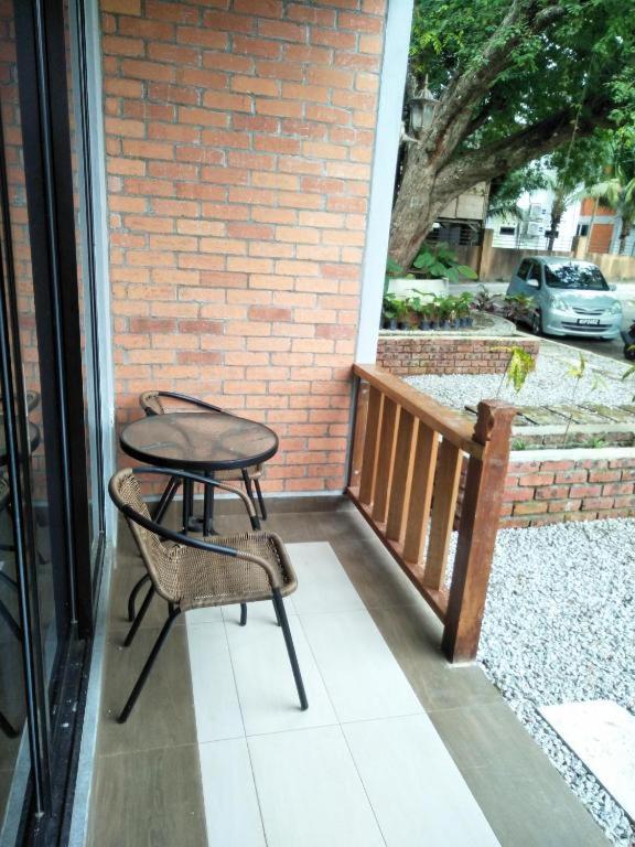 Ein Balkon oder eine Terrasse in der Unterkunft Red Coral Cottage