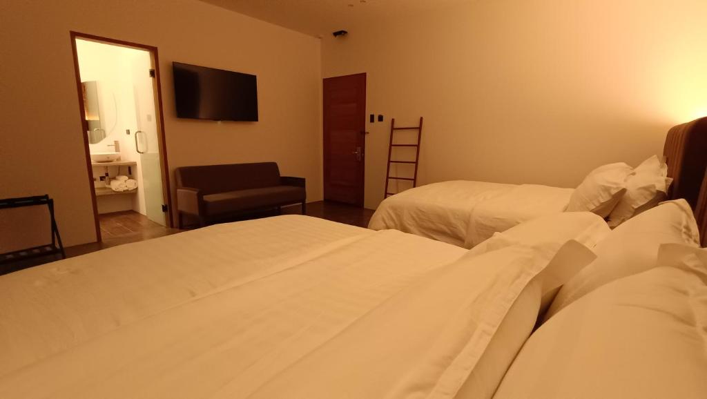 Postel nebo postele na pokoji v ubytování 928 Caxa Juan
