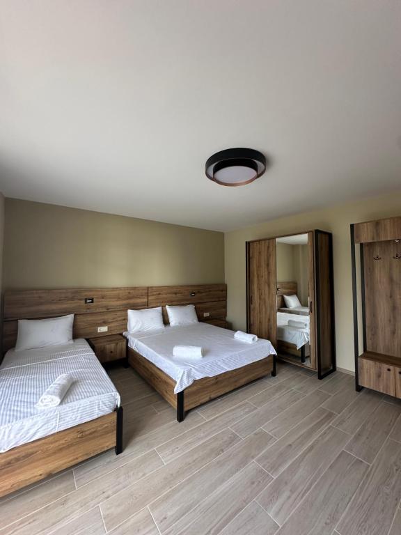 Postel nebo postele na pokoji v ubytování Paradise Shekvetili