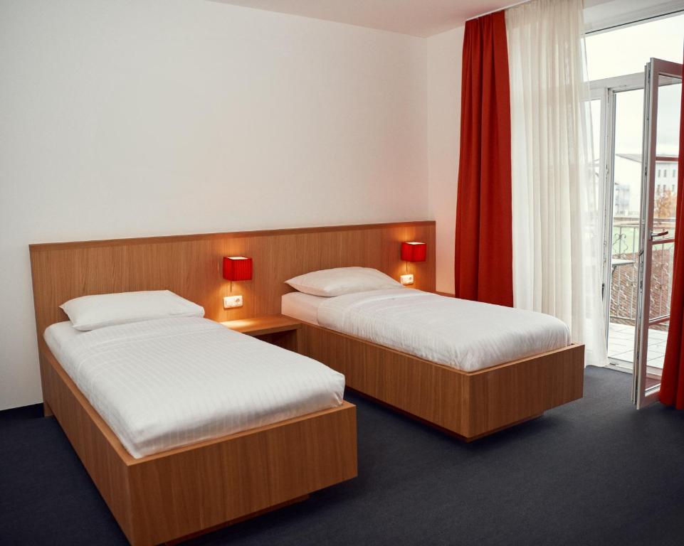 Postel nebo postele na pokoji v ubytování Kapellerhof
