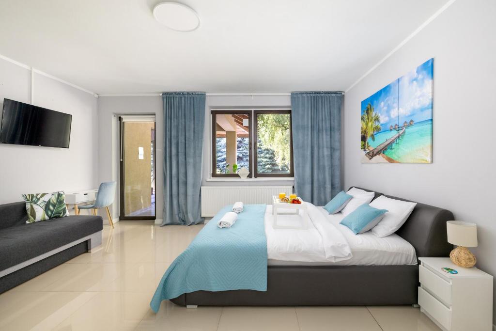 Ένα ή περισσότερα κρεβάτια σε δωμάτιο στο Forest Villa w pobliżu Suntago