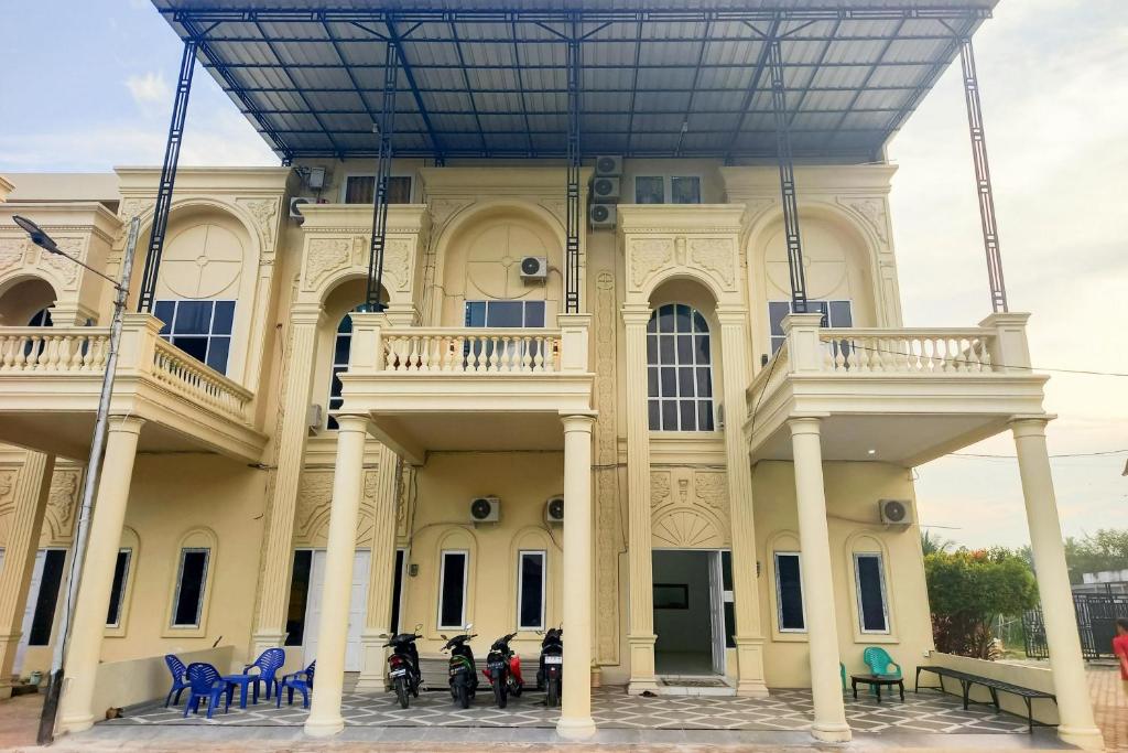 Balkón nebo terasa v ubytování RedDoorz Syariah at Sungai Pinang Muara Bungo