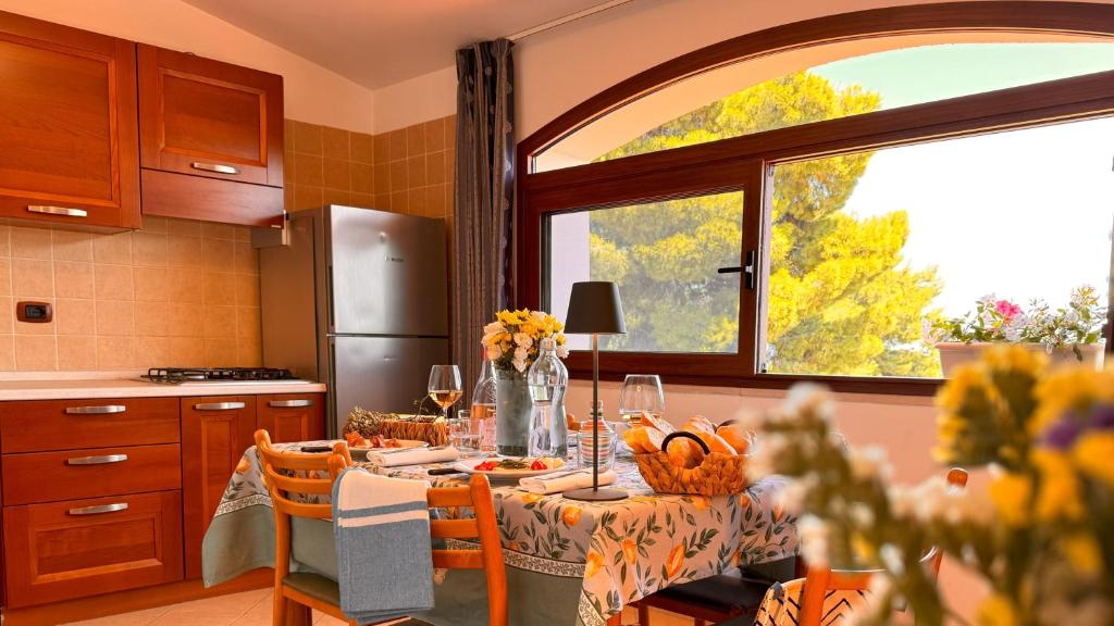 Kuchyň nebo kuchyňský kout v ubytování Villaggio Idra residence