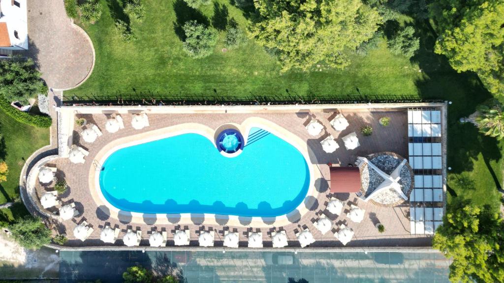 Bazén v ubytování Villaggio Idra residence nebo v jeho okolí
