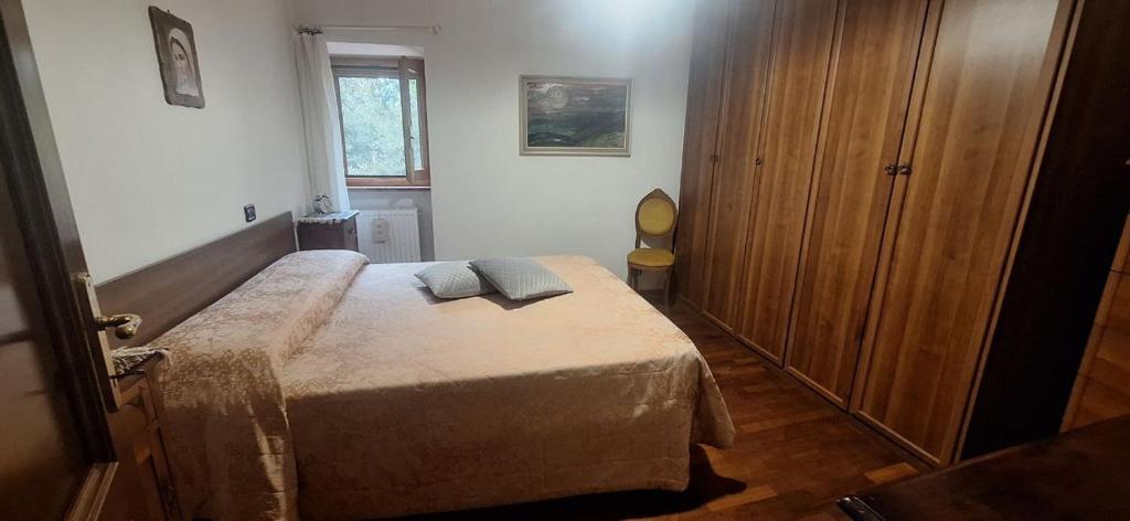Postel nebo postele na pokoji v ubytování Casa Ausonia
