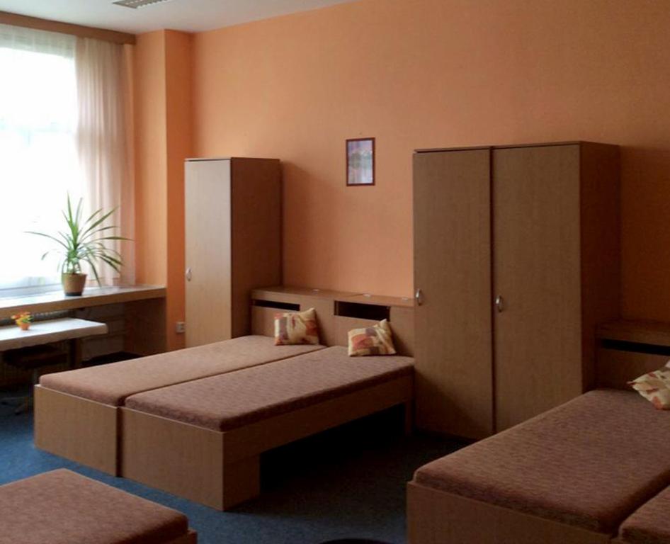 Postel nebo postele na pokoji v ubytování penzion FIT