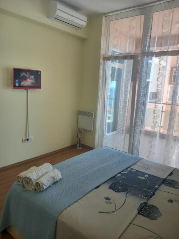 Postel nebo postele na pokoji v ubytování APARTAMENT APOLONIA 3 CAMERE CU VEDERE LA MARE a40