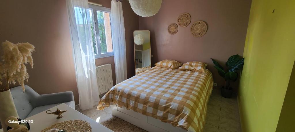 Postel nebo postele na pokoji v ubytování Maison avec jardin à Frontignan