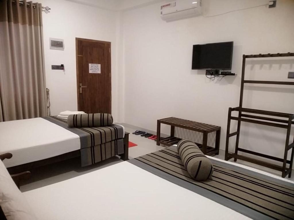 TV a/nebo společenská místnost v ubytování Golden Residence