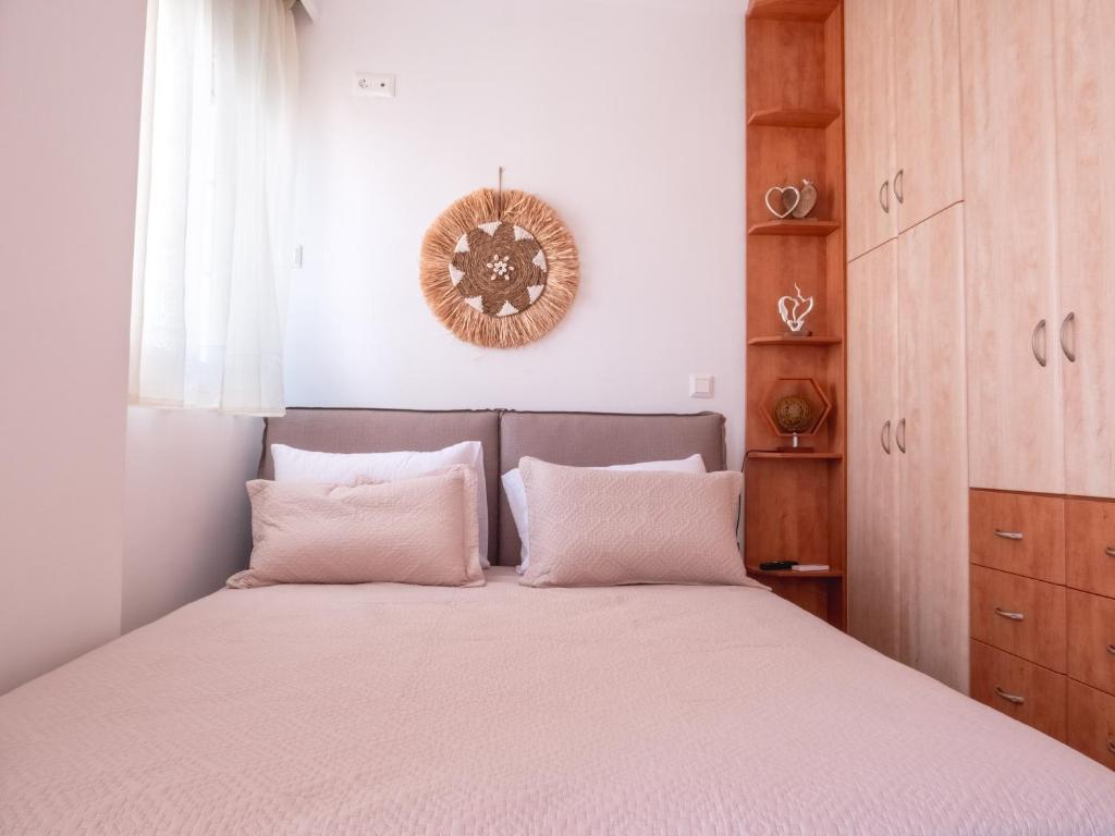 Postel nebo postele na pokoji v ubytování Athina's Home