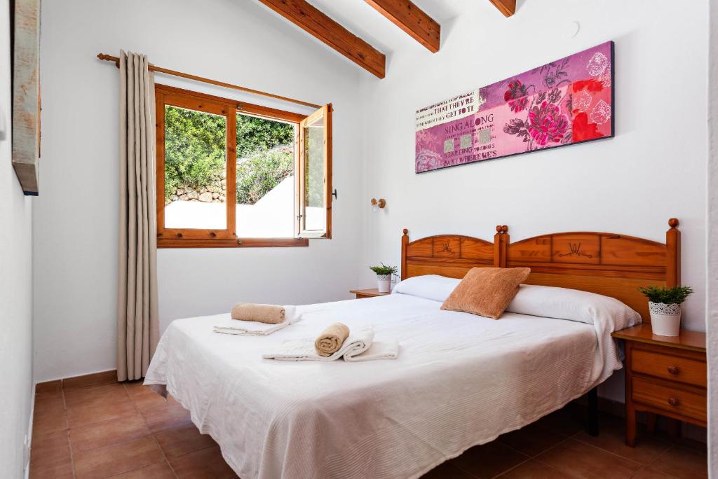 Postel nebo postele na pokoji v ubytování Villa Los Pinos