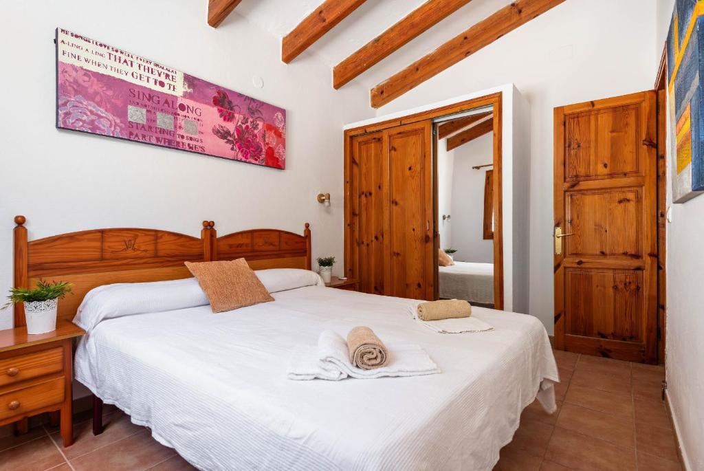 Postel nebo postele na pokoji v ubytování Villa Los Pinos