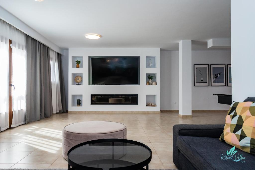 TV a/nebo společenská místnost v ubytování Casa Familia