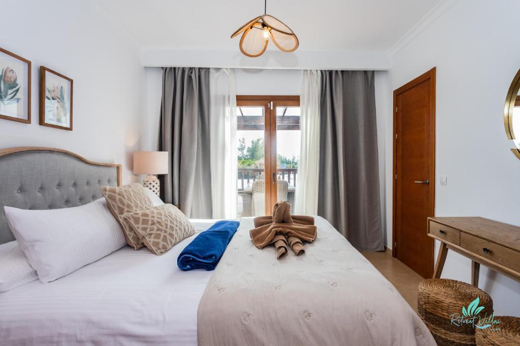 Postel nebo postele na pokoji v ubytování Casa Familia