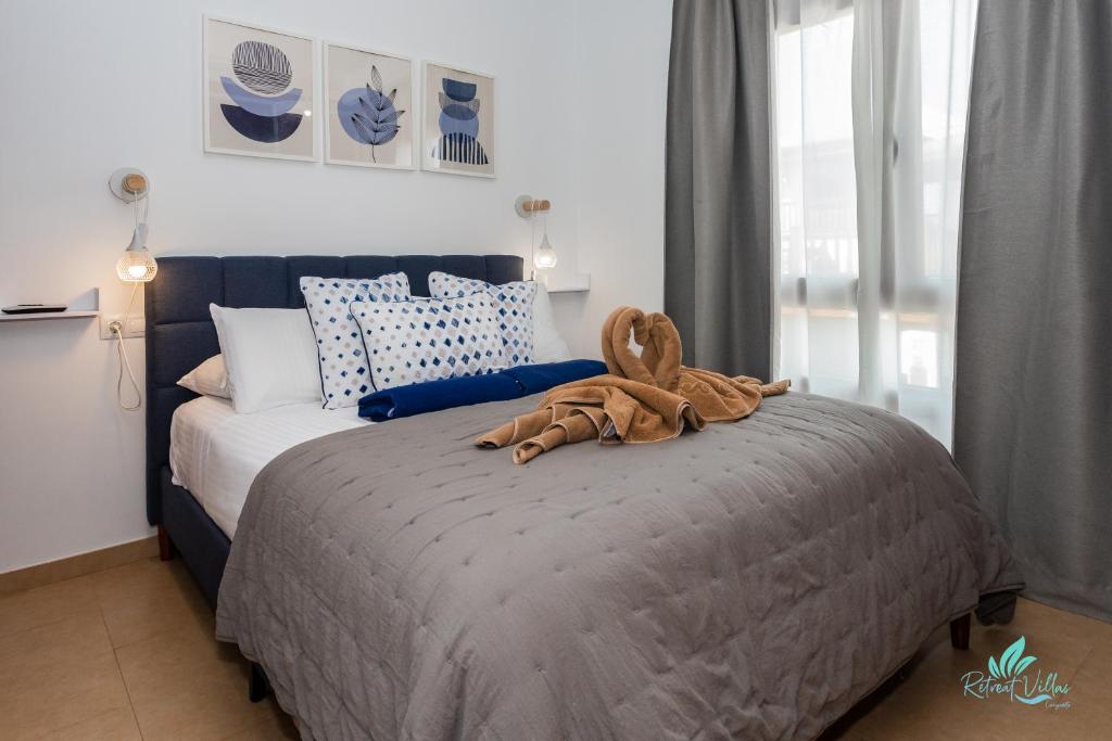 Postel nebo postele na pokoji v ubytování Casa Familia