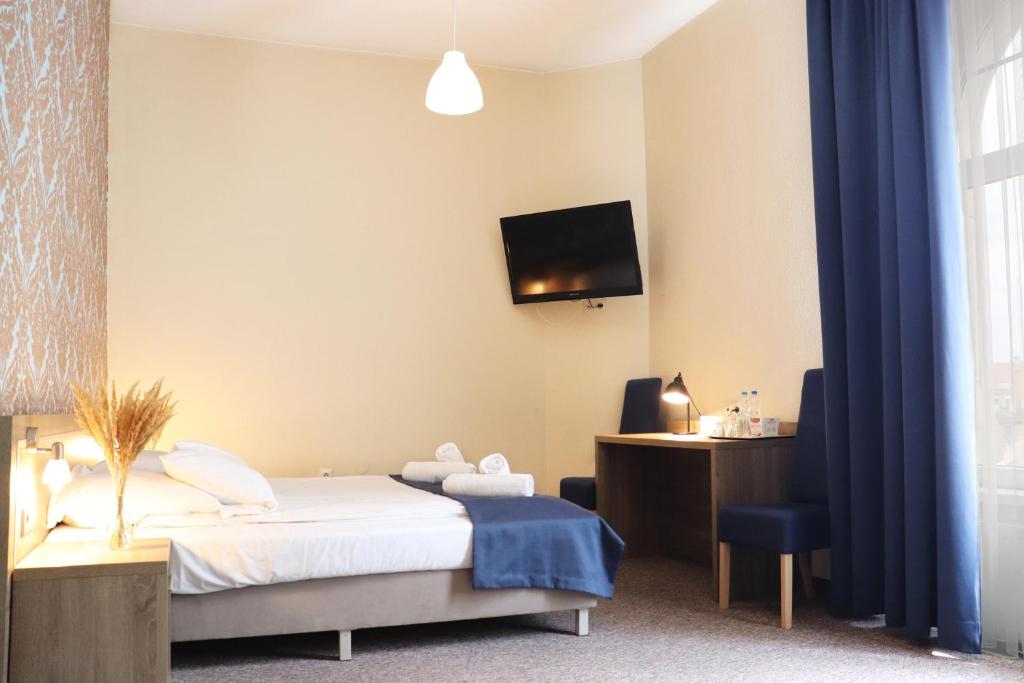 Posteľ alebo postele v izbe v ubytovaní Hotel Lothus