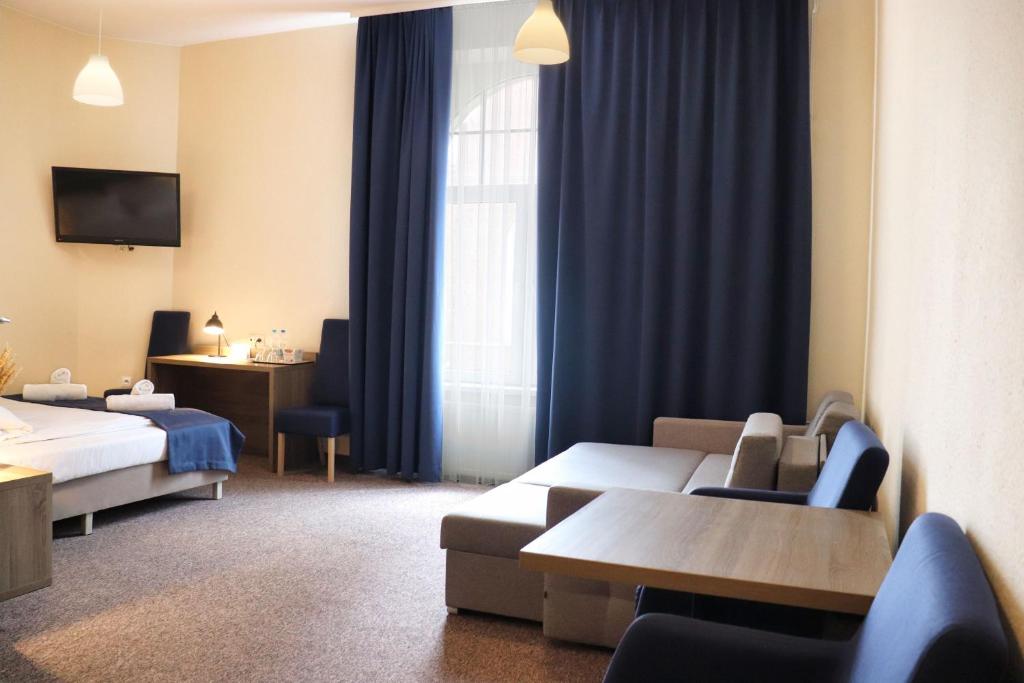 Posteľ alebo postele v izbe v ubytovaní Hotel Lothus