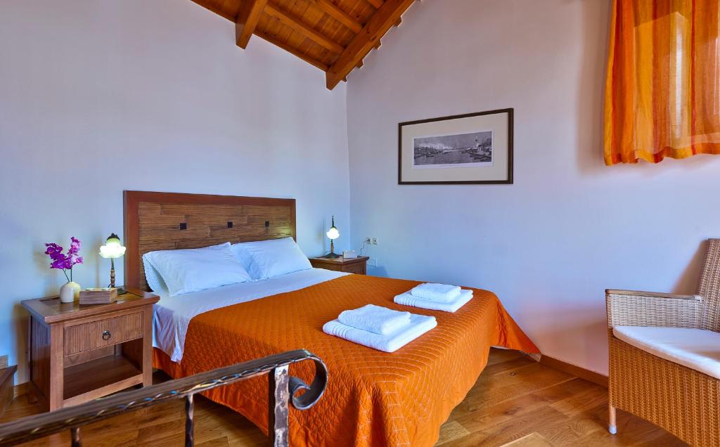 Posteľ alebo postele v izbe v ubytovaní Kores Boutique Houses