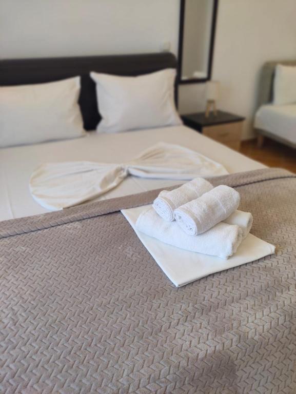 Postel nebo postele na pokoji v ubytování Lula Apartments