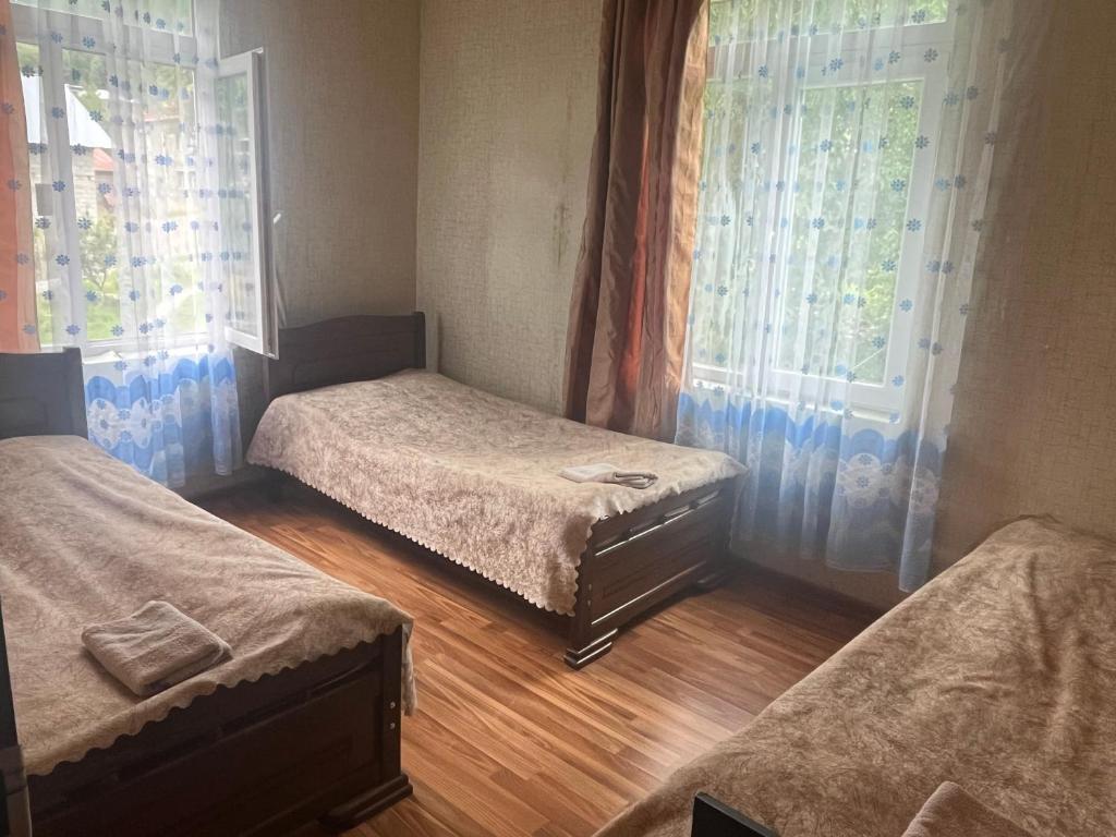 Postel nebo postele na pokoji v ubytování Guesthouse Tanano/Dodo