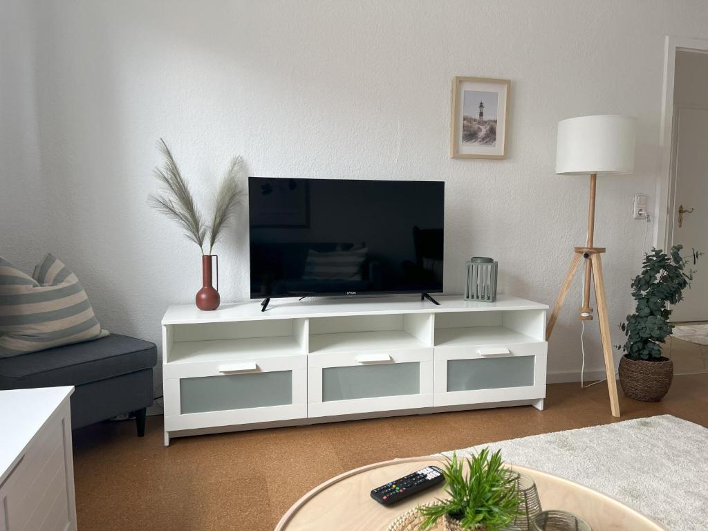 TV a/nebo společenská místnost v ubytování Küstenbude Strandbude