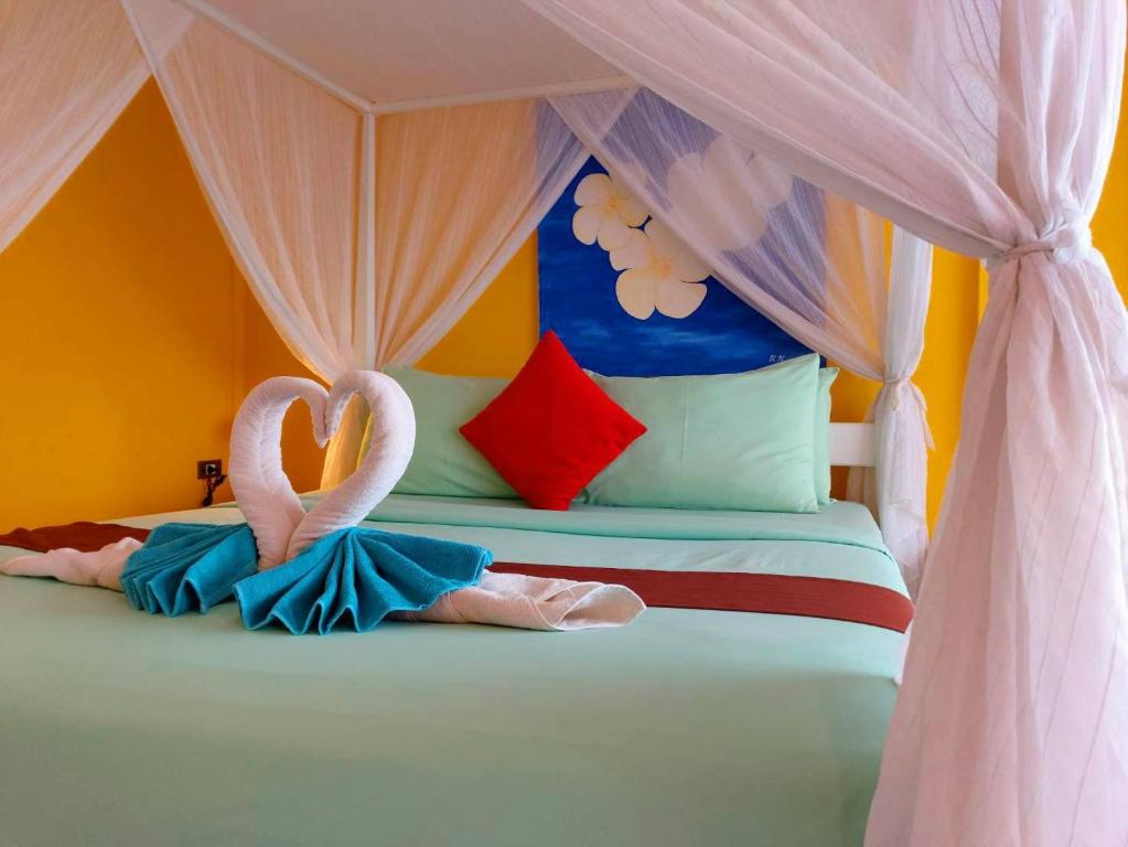Postel nebo postele na pokoji v ubytování Lareena Resort Koh Larn Pattaya
