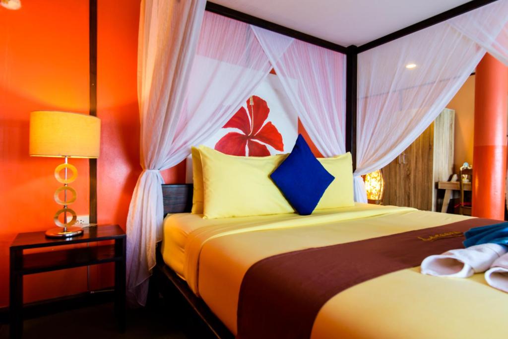 Postel nebo postele na pokoji v ubytování Lareena Resort Koh Larn Pattaya