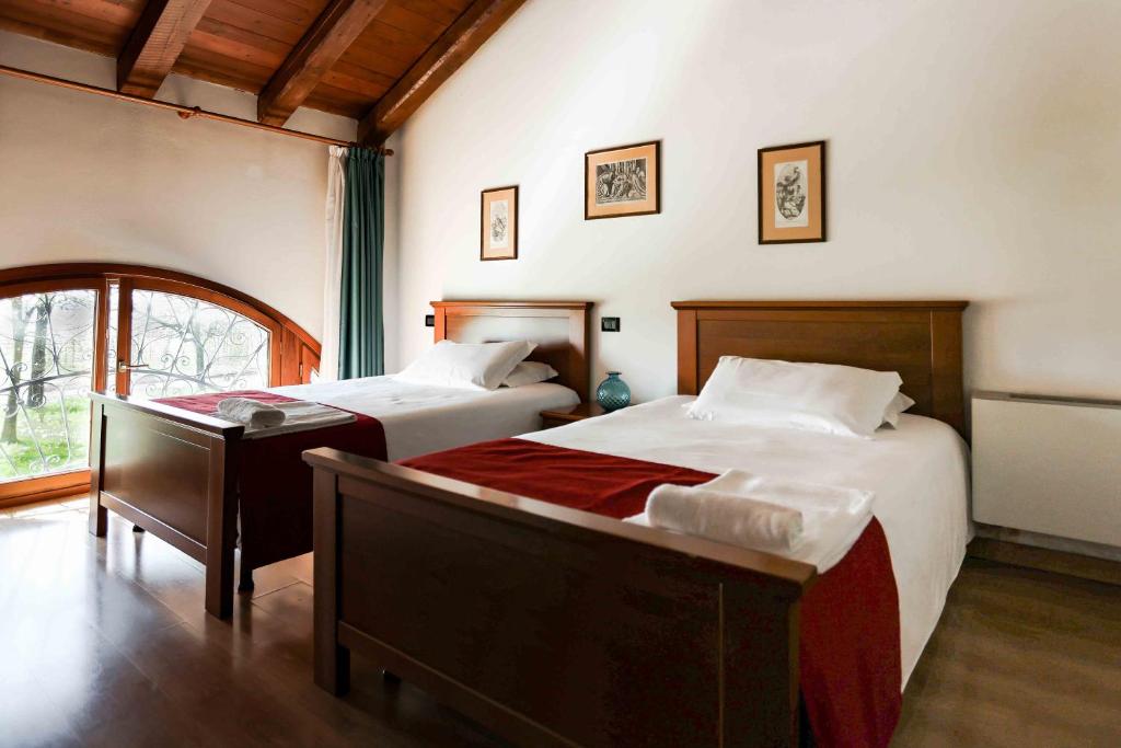 Postel nebo postele na pokoji v ubytování Agriturismo Rechsteiner
