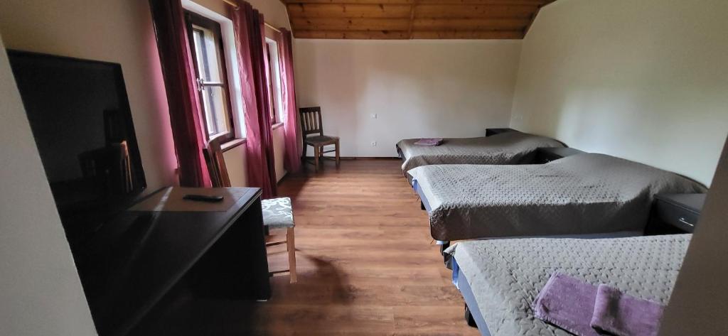 Postel nebo postele na pokoji v ubytování Goodwin Guest House