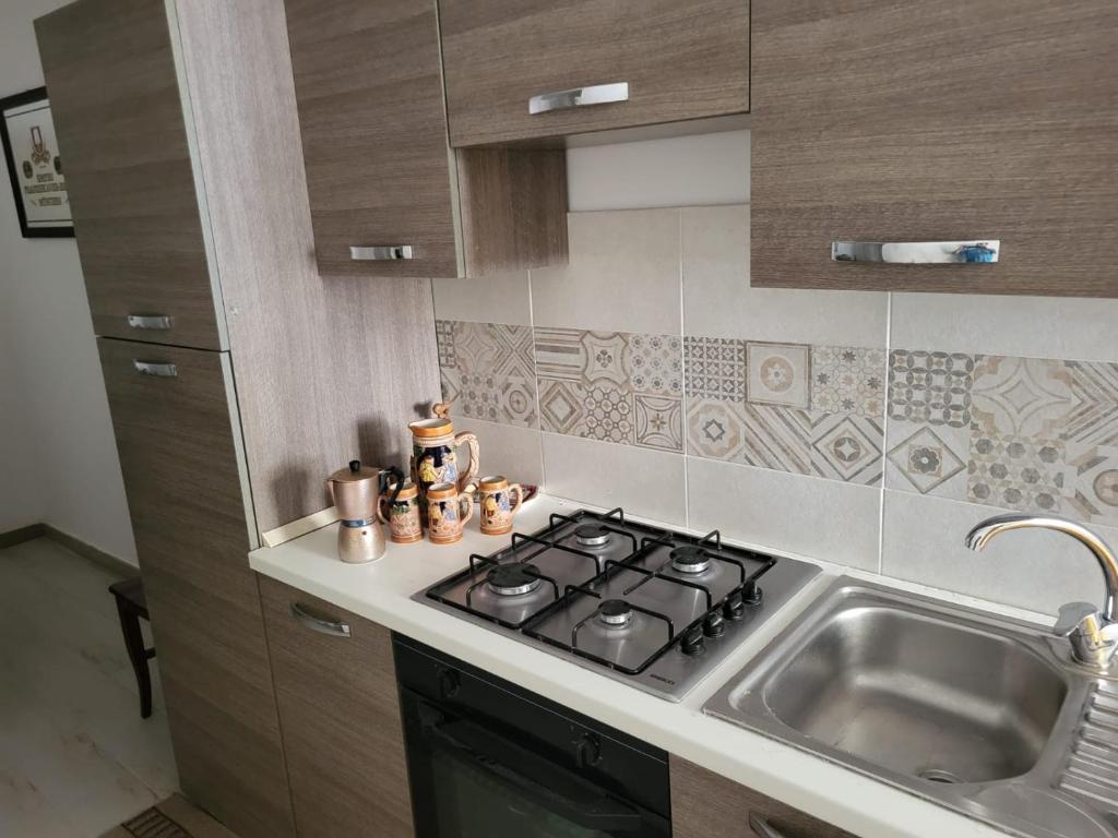 Kuchyň nebo kuchyňský kout v ubytování A casa di Luigi