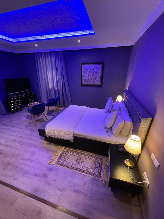 Postel nebo postele na pokoji v ubytování Hotel La Perle du Sud