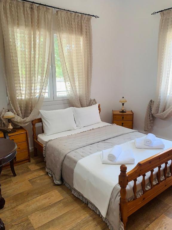 Postel nebo postele na pokoji v ubytování Villa Thea