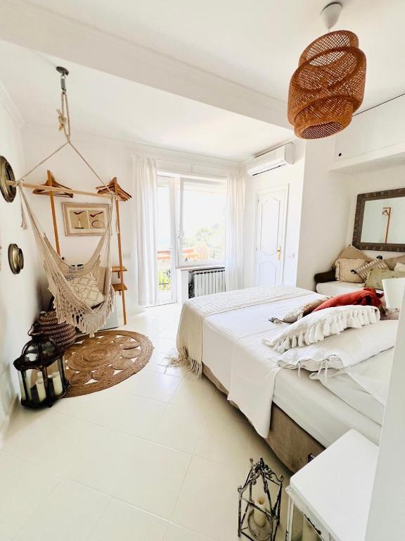 Postel nebo postele na pokoji v ubytování Casa Maddy