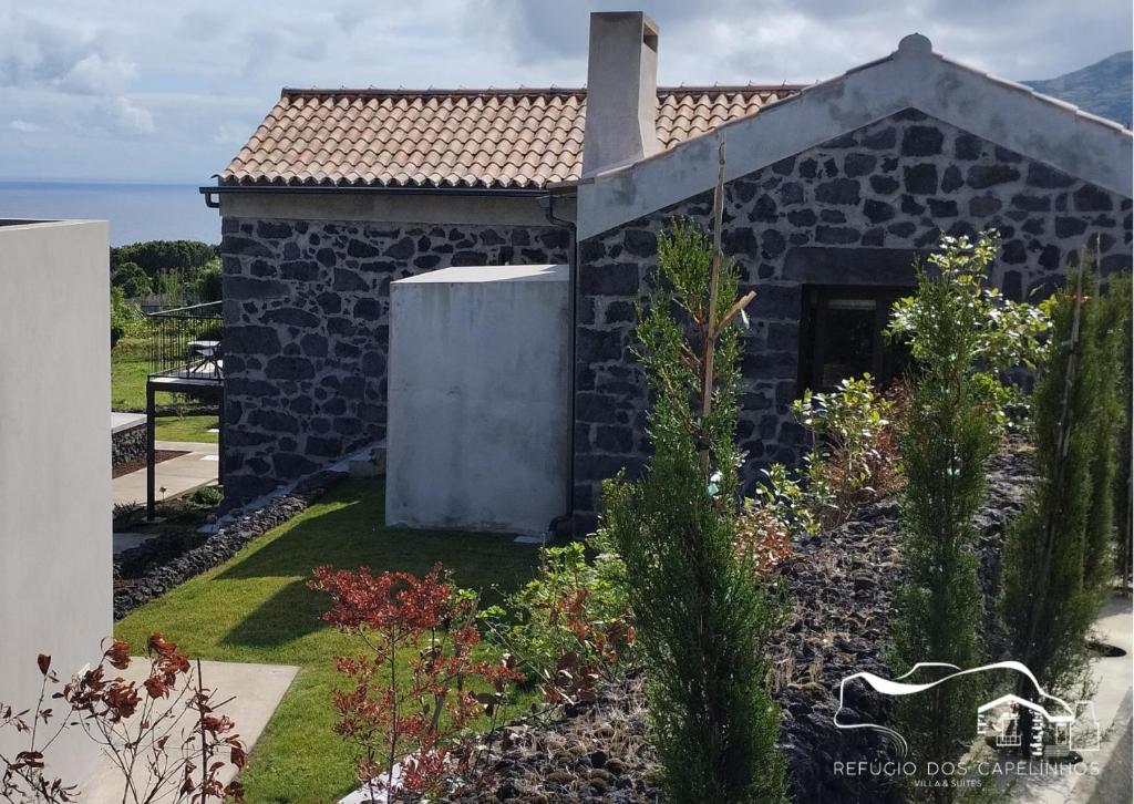 Zahrada ubytování Refúgio dos Capelinhos - Villa e Suites