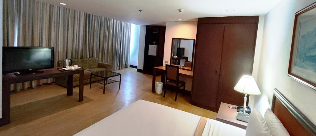 TV a/nebo společenská místnost v ubytování Rajah Park Hotel by Hiverooms