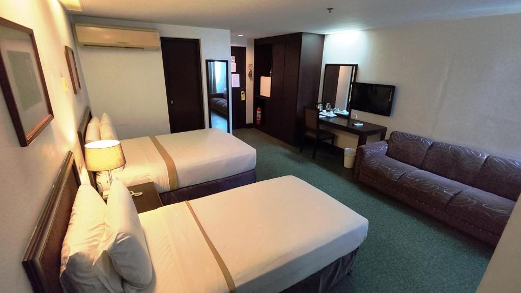 TV a/nebo společenská místnost v ubytování Rajah Park Hotel by Hiverooms