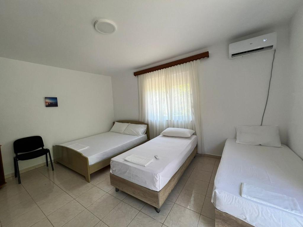 Voodi või voodid majutusasutuse Gjosasi House toas