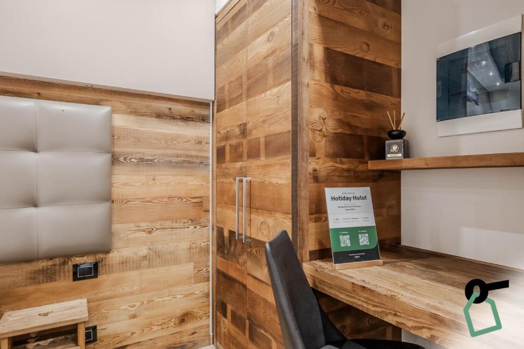 TV a/nebo společenská místnost v ubytování Hotiday Room Collection - Sauze Assietta