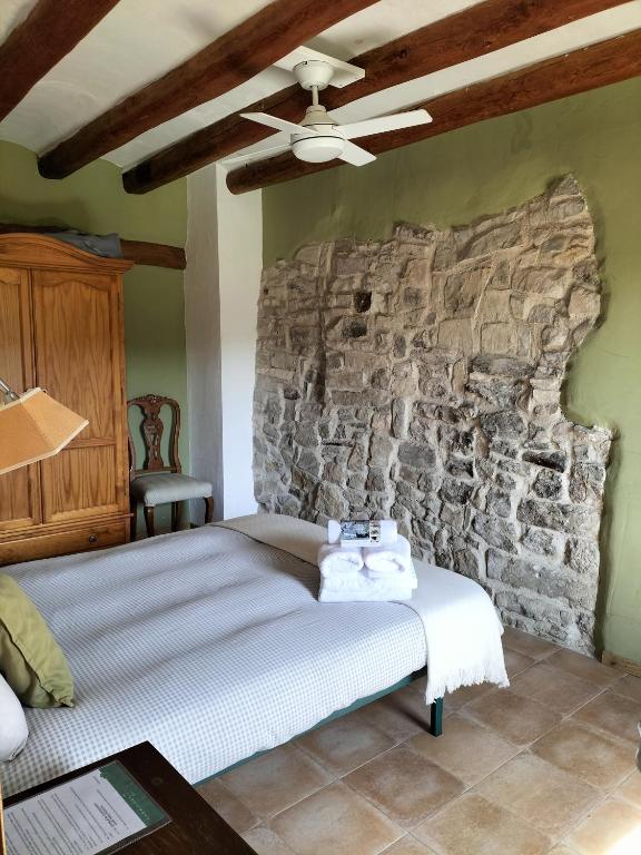 Postel nebo postele na pokoji v ubytování Casa Miret