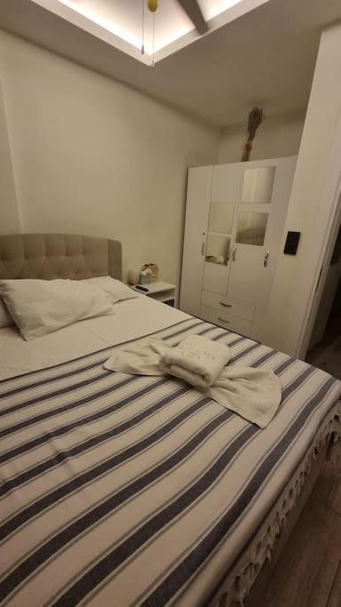Postel nebo postele na pokoji v ubytování Villa Oyster Park Isıtmalı Yıldız Efektli Çocuk Havuzlu Villa