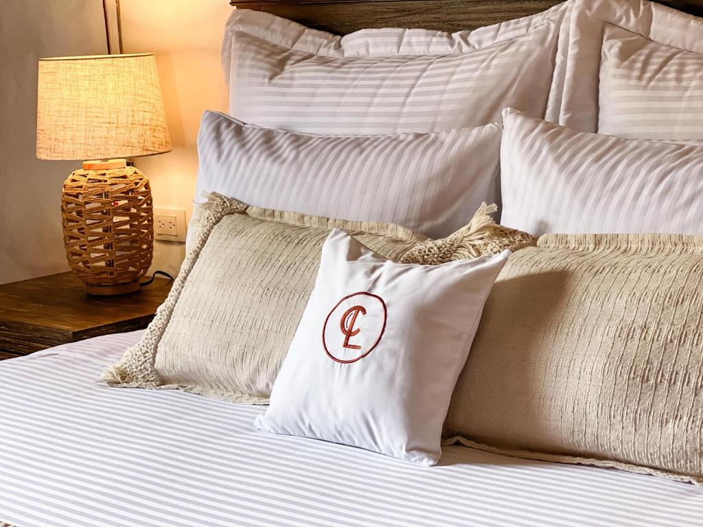 Postel nebo postele na pokoji v ubytování Casa Linaje Hotel Boutique - Cauca Viejo - Mayores de 10 años -