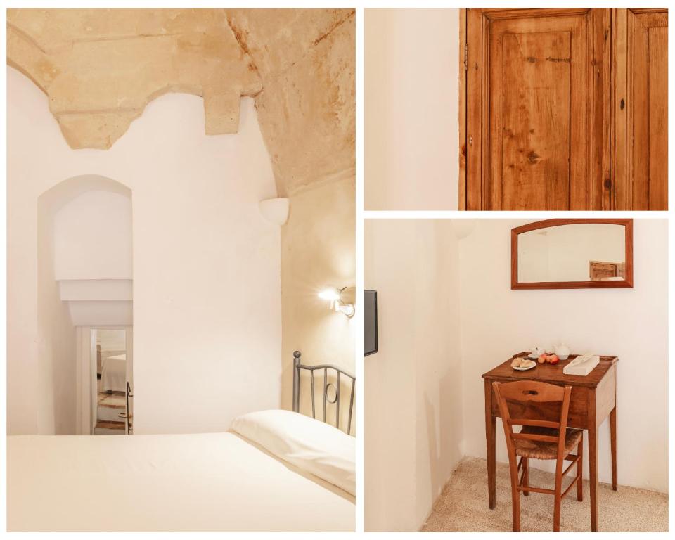 A bed or beds in a room at Hotel Sassi