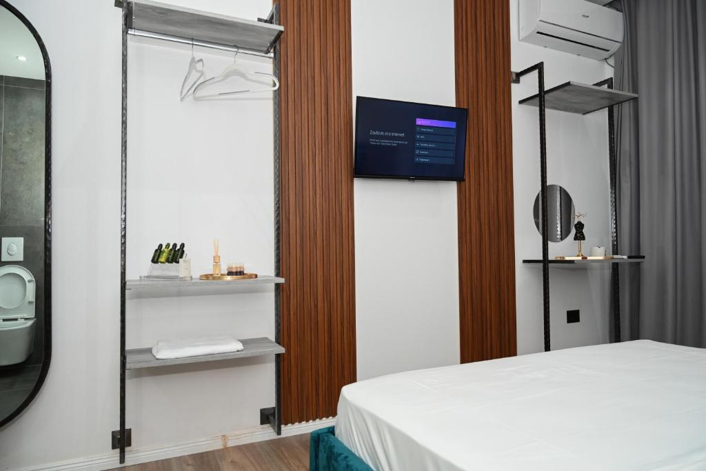 Postel nebo postele na pokoji v ubytování Apollonia Hotel