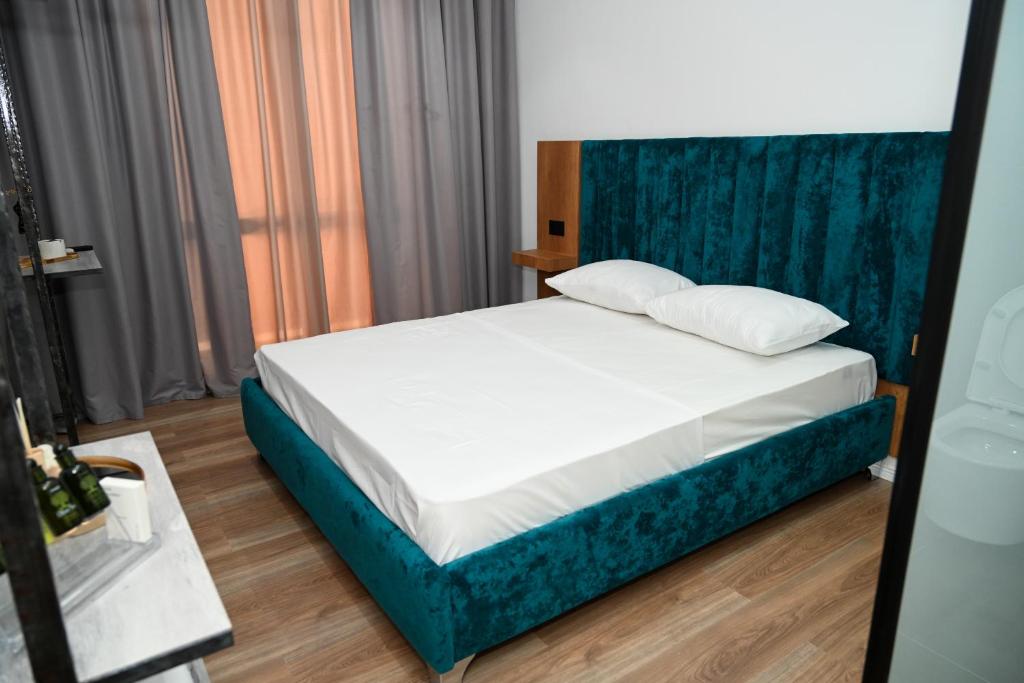 Postel nebo postele na pokoji v ubytování Apollonia Hotel