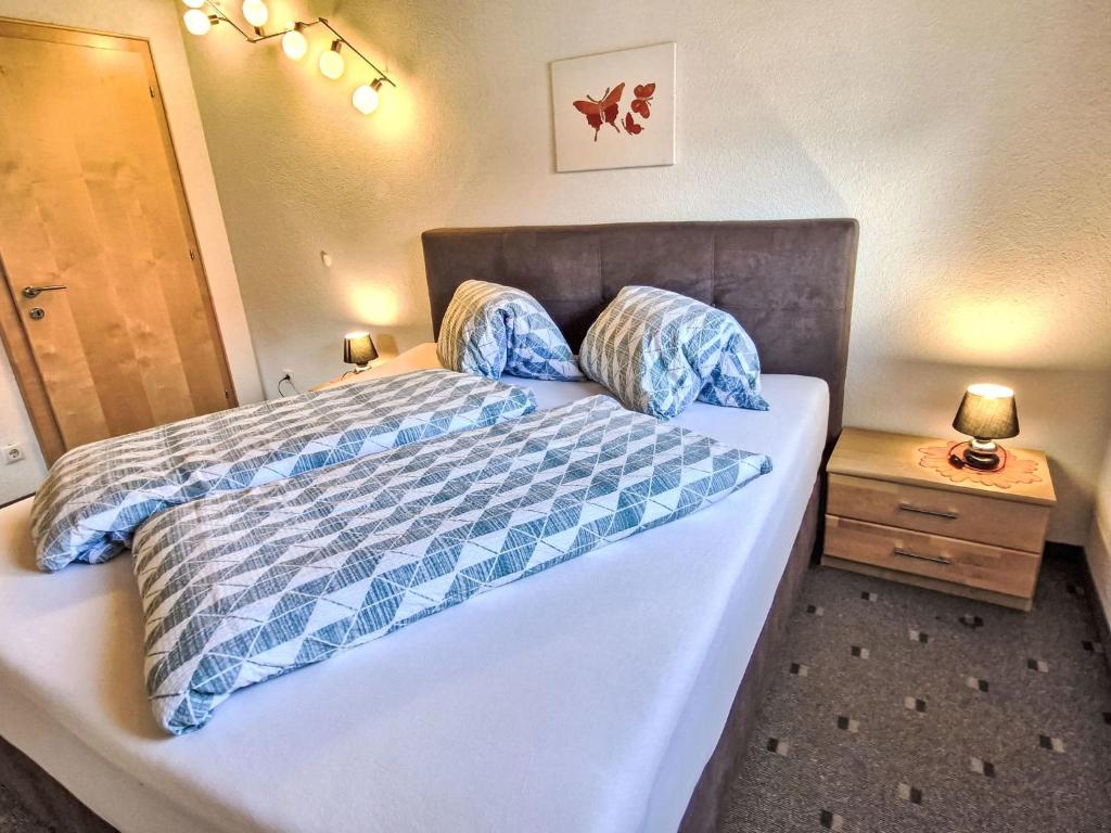 A bed or beds in a room at Holiday Home Heidi by Interhome