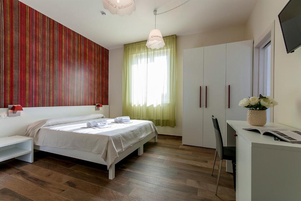 Postel nebo postele na pokoji v ubytování Zacapa B&B