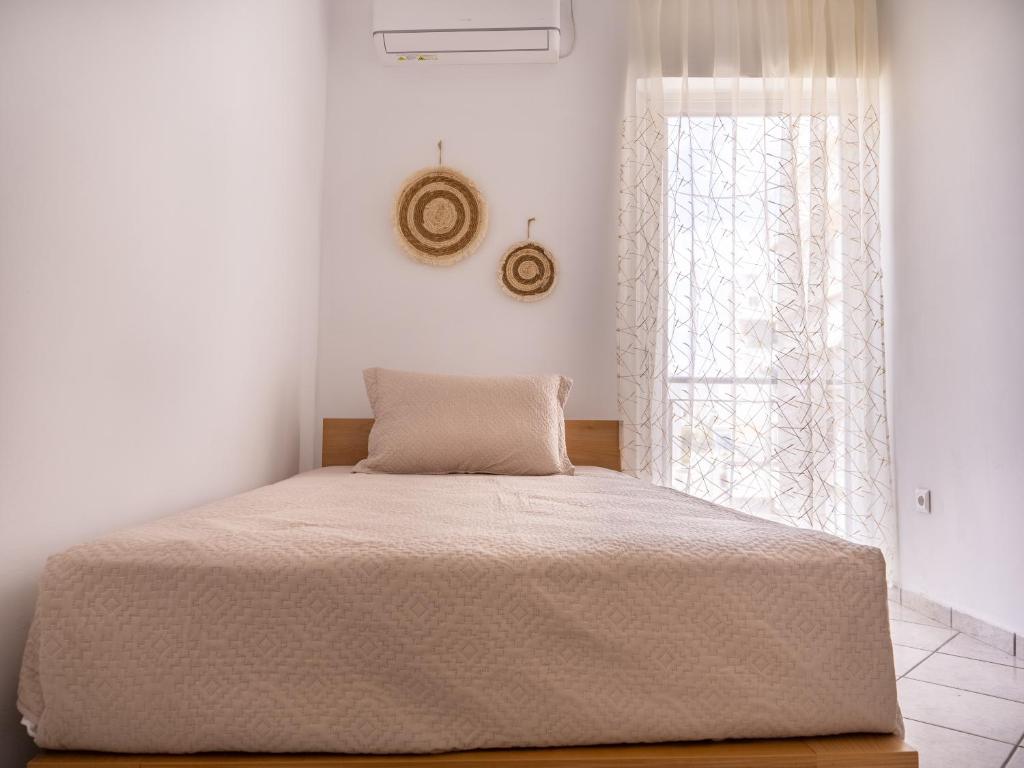 Postel nebo postele na pokoji v ubytování Athina's Home