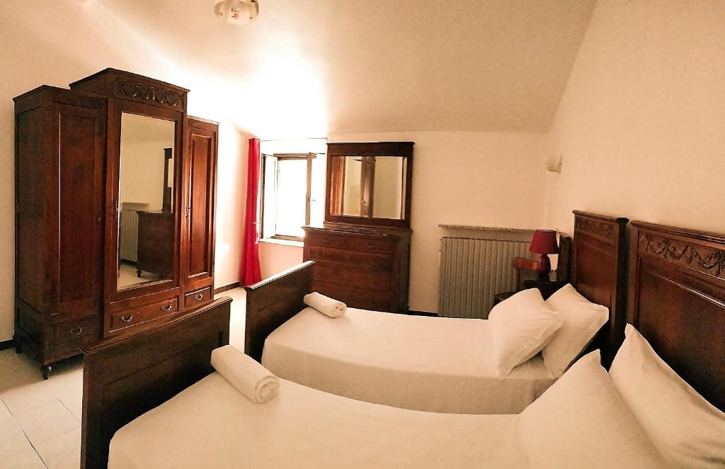 Postel nebo postele na pokoji v ubytování Casa dell'Angelo custode