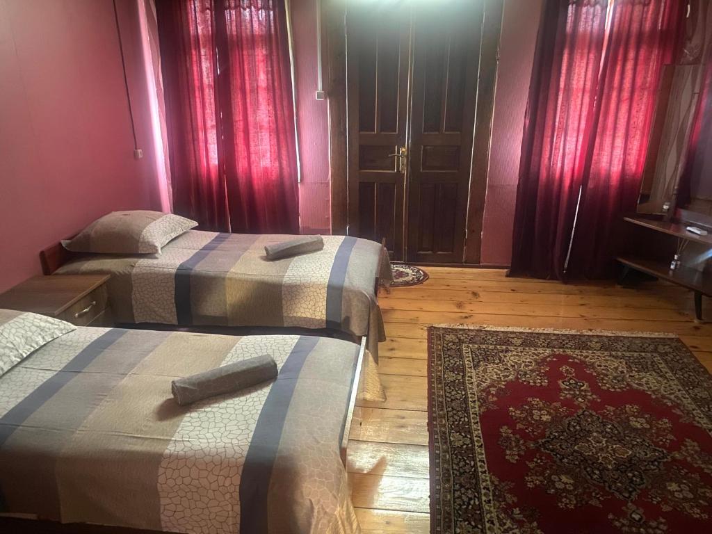 Postel nebo postele na pokoji v ubytování Guesthouse Dadia